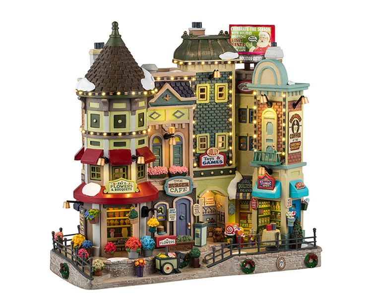 Lemax -'Jingle Bell Bazaar'- Verlichte Facade - Exclusief adapter (Werkt op batterijen) afbeelding